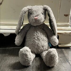 Manhattan Toy gray plush bunny with green and blue polkadot ears